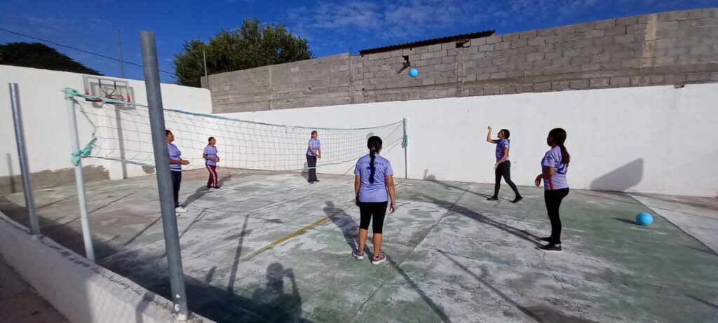 girls practicing volleyball