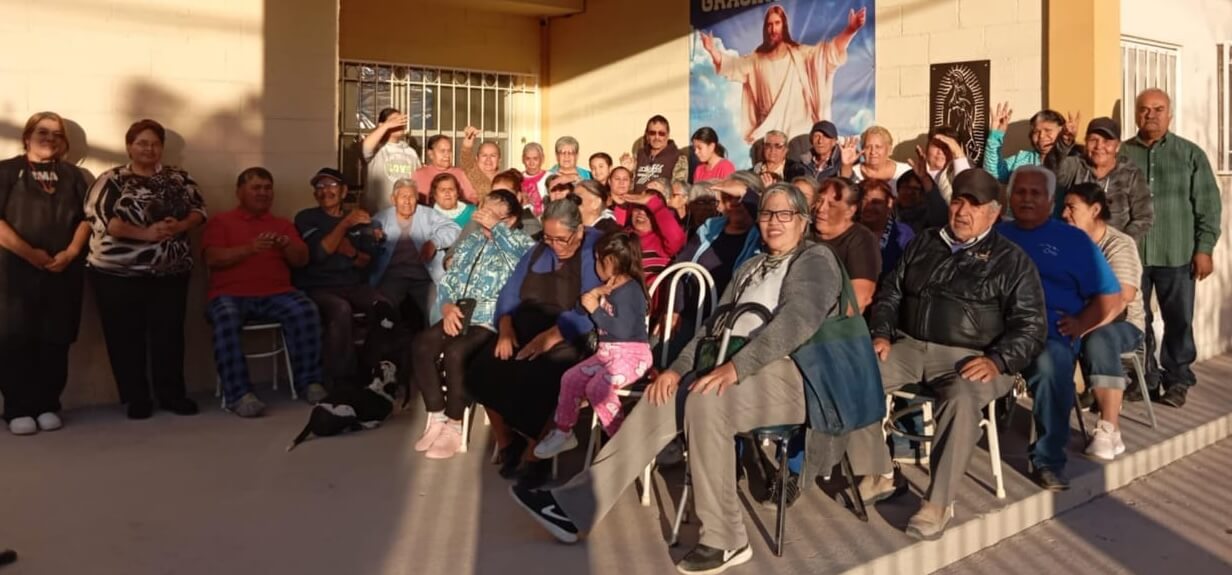 elderly pictured outside their senior center