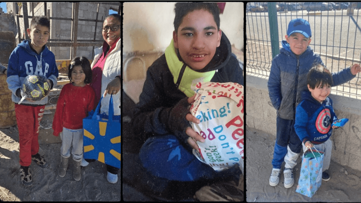 children receiving Christmas presents