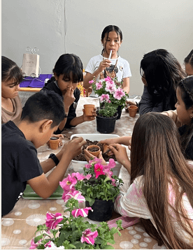 children arranging flowers