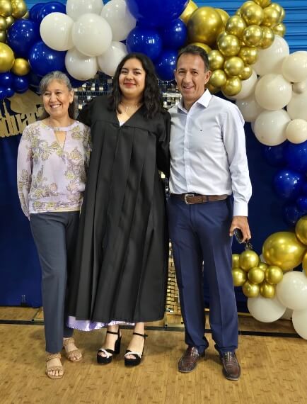 Lupita graduating from high school.